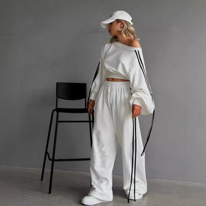 <span class=keywords><strong>Completo</strong></span> Casual da Donna <span class=keywords><strong>Elegante</strong></span> con Strisce Laterali T-Shirt a Maniche Lunghe e Pantaloni a Gamba Larga Set Bianco da Due Pezzi per le Vacanze - Product Image 1