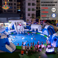 Parc aquatique gonflable commercial extérieur personnalisé en usine avec toboggan aquatique, piscine, jeux du monde des glaces et de la neige