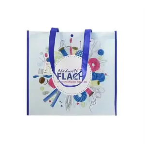 प्रोमोशनल विज्ञापन शॉपिंग आपूर्तिकर्ता पैकेजिंग रिबन के साथ लैमिनेटेड नीला सफेद टोट गैर-बुना उपहार बैग