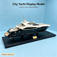 Modèle de yacht urbain personnalisé avec coque noire et blanche et support d'exposition