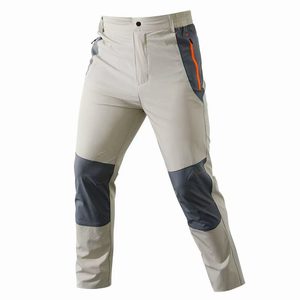 กางเกงเดินป่า SFB123 น้ำหนักเบา ยืดหยุ่นได้ สำหรับผู้ชาย สีกากี ผ้า softshell ป้องกันหัวเข่า พร้อมซิปกระเป๋าข้าง สำหรับตั้งแคมป์และปีนเขา - Product Image 4