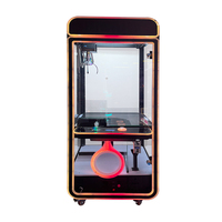 Machine de jeu d'arcade moderne à LED transparente, type machine à pinces, à fort potentiel de profit, pour hall d'hôtel et parc d'attractions