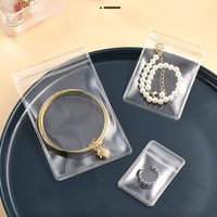 Bolsa de joyería con cierre de cremallera transparente de PVC transparente, bolsa de embalaje autosellada con cremallera de plástico a prueba de polvo de tamaño pequeño para anillos y pendientes