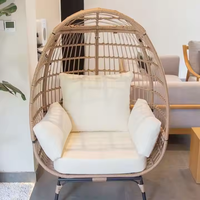 Échantillon gratuit Chaise balançoire en osier suspendue en forme d'oeuf pour l'intérieur moderne Meubles de jardin en rotin en métal Balançoire extérieure pour le patio