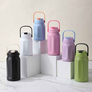 Stainless Steel Vacuum Tumbler With Handle And Lid Minimalist Design For Travel 24H Insulation - Product Image 1