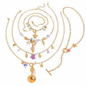 Conjunto de collar de acero inoxidable chapado en oro de 18 quilates estilo Ocean Resort con dijes de estrella y corazón para mujer, joyería de moda. - Product Image 1
