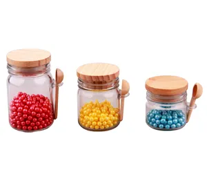 hotsale 150ml bulk glass candy jar kitchen accessories utensils with wooden lid and wooden spoon for spice and seasoning