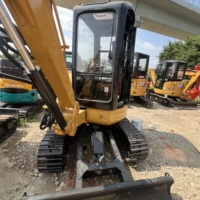 Mini-pelleuse Caterpillar 303.5 d'occasion à faible nombre d'heures de fonctionnement, 3,5t, hydraulique, avec chenilles en caoutchouc durables pour la ferme
