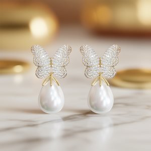 E3547 Orecchini pendenti a forma di farfalla in oro bianco con perle finte e strass, gioielli da sposa alla moda per donna - Product Image 2