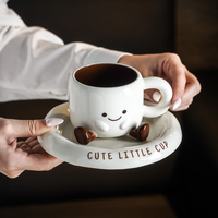 Mug à café en céramique mignon avec soucoupe, motif adorable visage souriant et pied, idéal pour la maison, le bureau ou comme cadeau