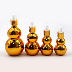 Bouteilles en verre compte-gouttes transparentes ambrées brillantes en forme de cantaloup de 15 ml, 20 ml, 30 ml, 50 ml pour huiles essentielles - Product Image 2