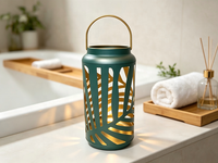 Lanterne en métal bleu sarcelle à découpes en forme de feuille, lanterne décorative portable en fer avec bordure dorée, option d'éclairage LED personnalisable