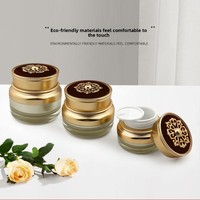 Flacons en acrylique pour cosmétiques, sérum, lotion, crème pour le visage, fond de teint, avec bouchon en plastique doré en forme de fleur, pot cylindrique en stock