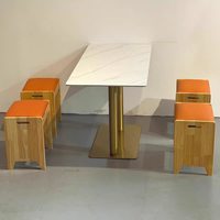 Ensemble de salle à manger en rotin peu encombrant avec structure métallique et plateau en marbre pour restaurants rapides et snack-bars