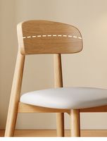 Chaises de salle à manger au design élégant, dossier en planches courbées et assise confortable avec siège en albâtre et structure en obsidienne pour pâtisserie et charcuterie