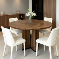 Table à manger ronde extensible haut de gamme en placage de noyer, base croisée en bois massif, style moderne et luxueux, pour la maison et l'hôtellerie
