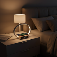 Mobiele telefoon aan het bed 10W Drie-in-één draadloze oplaadbeugel Aanraakdetectie Desktopdecoratie Wekker Moderne eenvoud