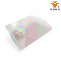 Film autocollant holographique transparent pour lamination de pochettes et cartes