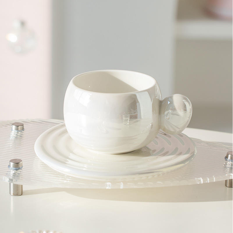 White milk ring coffee cup and saucer