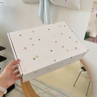Boîte cadeau en papier ondulé blanc à motif d'étoiles colorées, boîte d'emballage personnalisée imprimée pour les petites entreprises, boîte d'expédition pour colis