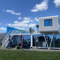 Maison préfabriquée en conteneur pliable et mobile à prix abordable, avec panneaux sandwich en laine de roche, pour campement, hôtel, gîte