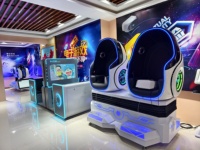 Jeux d'intérieur/extérieurs de réalité virtuelle de cinéma en métal et plastique 9D cinéma 2 de chaise d'oeufs de réalité virtuelle sièges 360 tours de parc de VR