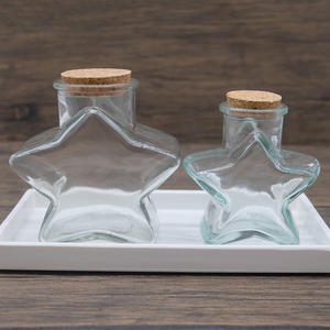 Botella <span class=keywords><strong>de</strong></span> vidrio <span class=keywords><strong>de</strong></span> mermelada <span class=keywords><strong>de</strong></span> pudín <span class=keywords><strong>de</strong></span> regalo <span class=keywords><strong>de</strong></span> boda <span class=keywords><strong>de</strong></span> Navidad con forma <span class=keywords><strong>de</strong></span> estrella decorativa <span class=keywords><strong>de</strong></span> alta calidad con corcho - Product Image 1