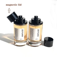 Flacon de parfum vide rond transparent de luxe en verre avec couvercle magnétique, 50 ml, 100 ml, à faible MOQ, avec pulvérisateur à sertir pour une bonne diffusion de brume