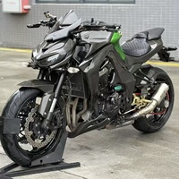 Moto naked Kawasaki 1Z1000 d'occasion, essence, 1000 cm³, moteur quatre cylindres, suspension réglable, plusieurs modes de puissance, puissante