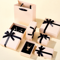 Boîte à bijoux haut de gamme en papier avec intérieur en éponge, gaufrage pailleté, pour bagues, boucles d'oreilles et colliers, vente en gros, fabrication OEM