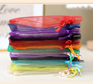 Sacchetti di <span class=keywords><strong>Organza</strong></span> con coulisse colorati di alta qualità per gioielli caramelle e regali a basso prezzo MOQ imballaggio tessile - Product Image 5