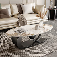 Table basse en pierre de style italien moderne et minimaliste avec structure en métal pour salon, design simple, table à thé ovale de luxe léger
