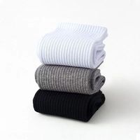 Chaussettes hautes unisexes pour adultes, en coton tricoté doux, couleur unie noir et blanc, avec logo discret, idéales pour le sport en automne, vente en gros