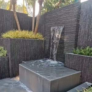 Paneles de piedra apilados naturales baratos en pizarra negra para decoración de pared de TV de fachada exterior de chimenea con acabado de superficie dividida - Product Image 1