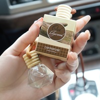Mini ambientador de Aire líquido de larga duración con colgante de aromaterapia ecológico para automóviles y fragancias cosméticas