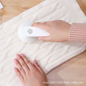 เครื่องกำจัดขุยไฟฟ้าสำหรับเสื้อผ้าทำด้วยผ้าขนสัตว์ ชาร์จ USB ได้ สีขาว ชมพู เขียว ใบมีดสแตนเลส - Product Image 5