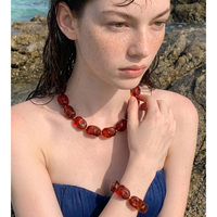 JINYOU 6455 Ensemble de bijoux en acier inoxydable avec collier et bracelet à maillons en perles de résine épaisses irrégulières à texture ambre bohème