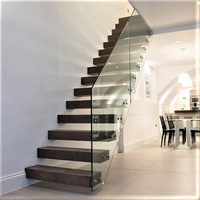 Escalier droit flottant moderne personnalisable pour intérieur, à marches ouvertes, gain de place, mural, en métal, avec finition de rampe en verre