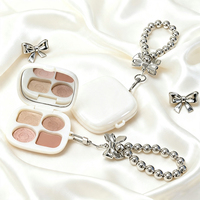 Palette de fards à paupières 4 couleurs mignonne avec porte-clés nœud perlé, format de poche, fards à paupières mats et scintillants avec miroir, cadeau maquillage