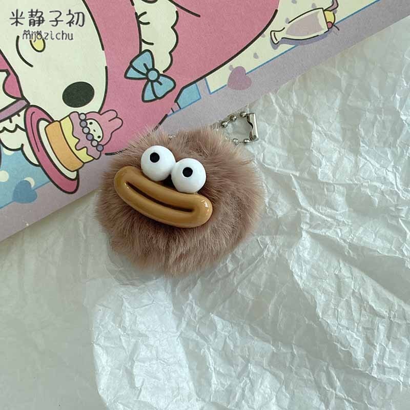 Porte-clés pompon bouche de saucisse kaki