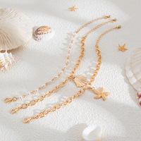 Collier et bracelet tendance en alliage, style vacances, multicouche, avec pendentif étoile de mer et coquillage, collection Océan, vente chaude