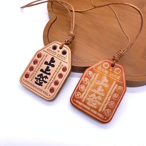 Porte-clés porte-bonheur en cuir véritable couleur naturelle, breloque de sac, ornement pour rétroviseur de voiture - Product Image 1