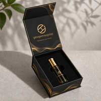 Boîte cadeau personnalisée en carton rigide magnétique pour huile d'oud, emballage de luxe noir et or pour flacon de parfum roll-on de 10 ml