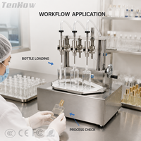 Machine de remplissage volumétrique à trois têtes pour parfums et liquides, petite machine de remplissage de liquides avec fixation réglable pour la production