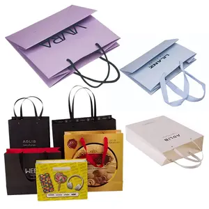 2024 Beauté logo personnalisé imprimé poignées découpées rose luxe shopping cadeau design coloré cosmétique emballage fantaisie sacs en papier