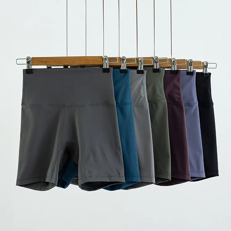 Pantaloncini elastici a vita alta di nuova vendita calda pantaloncini da corsa a tre punti di yoga di colore solido per le donne