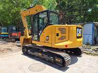 Excavatrice sur chenilles CAT 310 d'occasion à prix avantageux, mini-excavatrice Caterpillar de 10 tonnes d'occasion, matériel de construction à vendre