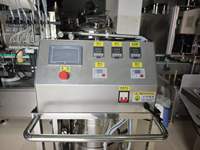 Machine de remplissage de bougies semi-automatique à double tête pour produits chimiques quotidiens, cosmétiques, parfums, aromathérapie et cire de soja