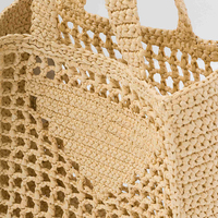 2023 nouvelle marque de luxe paille dames sac à main rotin tissé à la main sac plage évidé personnalisé Lafite paille sac à main