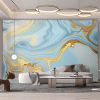 Panneau mural en PVC marbré bleu clair avec accents dorés élégants, améliore l'attrait esthétique des espaces résidentiels et commerciaux, installation facile